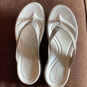 Crocs women’s flip flops- size 10. Worn once